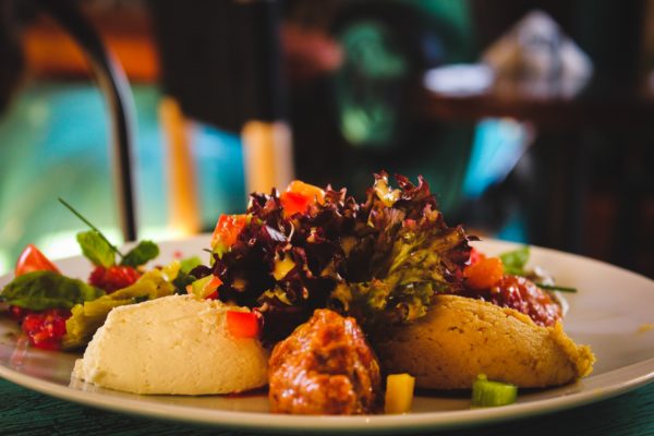 Picture of a plated full meal dish on a table